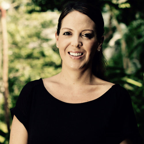 Kate Leff wearing a black shirt and staring into the camera